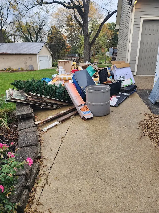 Dumpster being loaded with debris for Residential Dumpster Rental in Ravenna